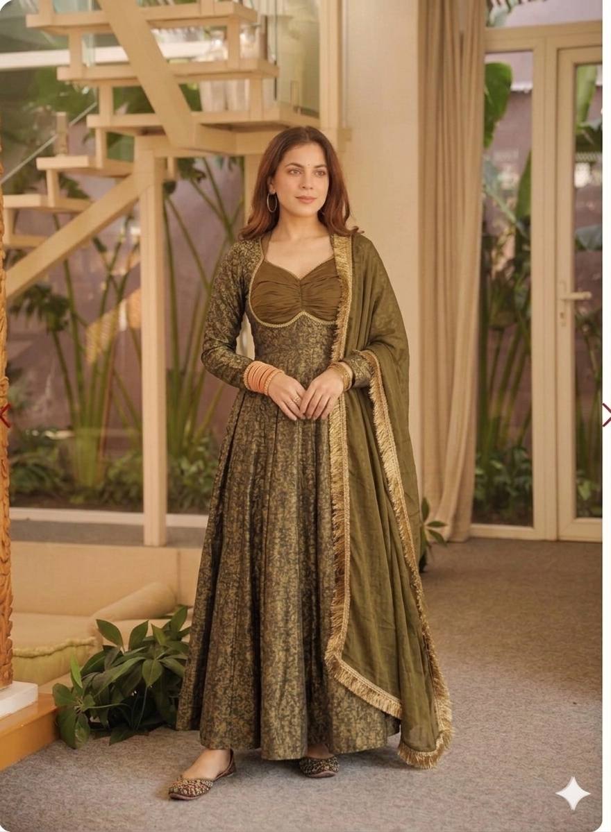 Opulent Mehendi Green Brocade Flared Anarkali Suit Set Featuring a Ruched Sweetheart Neckline, Woven Floral Motifs, and an Elegant Tie-Up Back